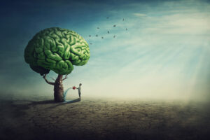 Surreal brain tree in a desolate land and a determined person watering it using a sprinkling can. 